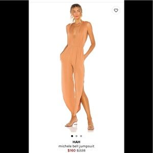 Slinky coral jumpsuit with pockets and slit leg